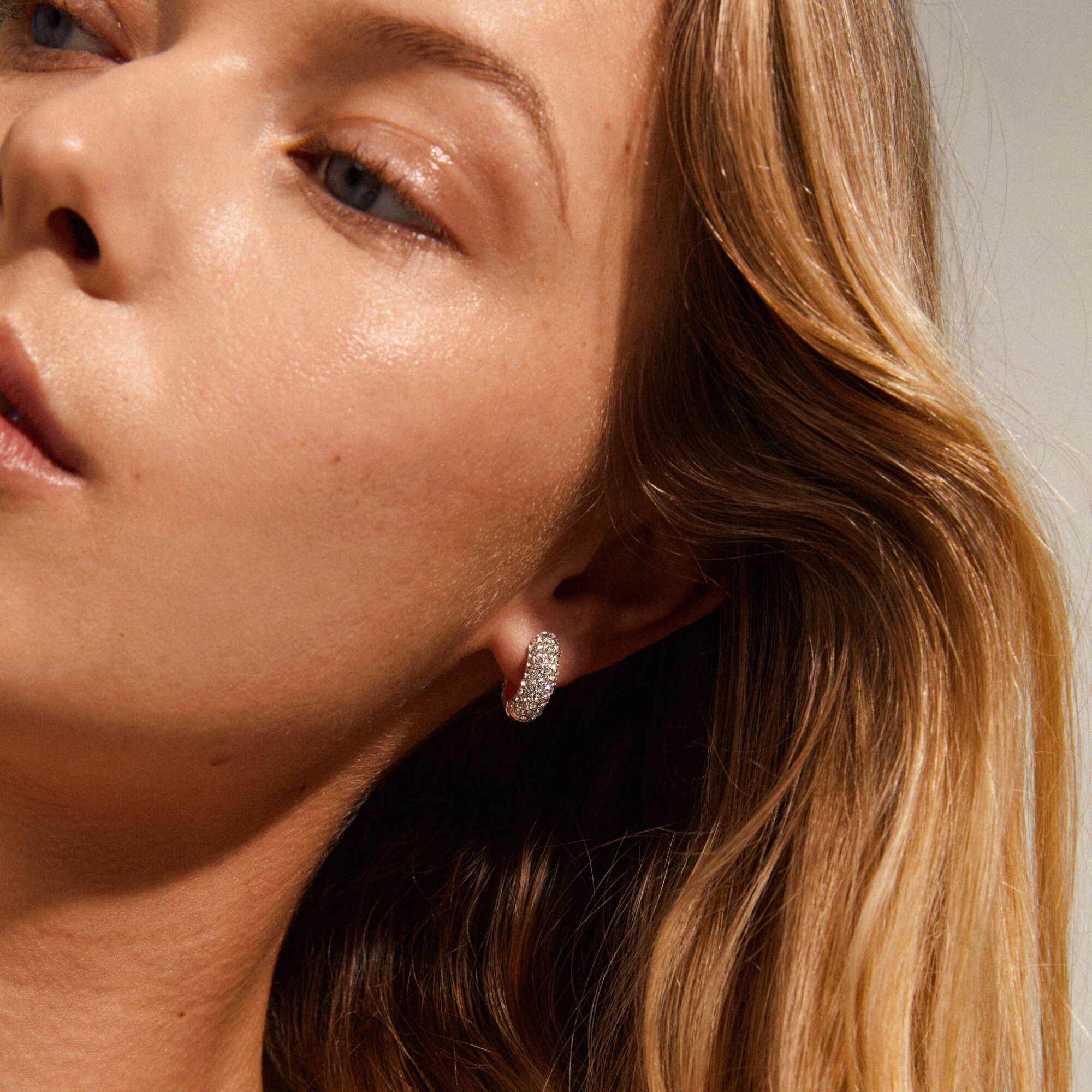 Crystal huggie hoop top earrings